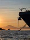 USA, Washington State, San Juan Islands, Sucia Island. Boats silhouetted in sunset. Art Print